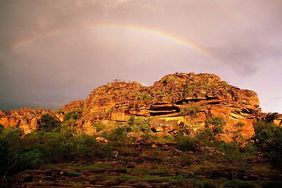 Rainbow over the cave outcrop, photo R Willis