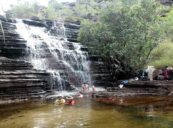 Baroalba, swimming below a wet season waterfall