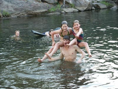 Carrying the kids in the water