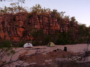 Twin Falls Creek camp, sunrise. Our guide already has the fire ready for the first cup of tea or coffee.