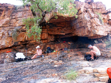 Resting in a rock shelter, Carr Boyd Range, Green Kimberley